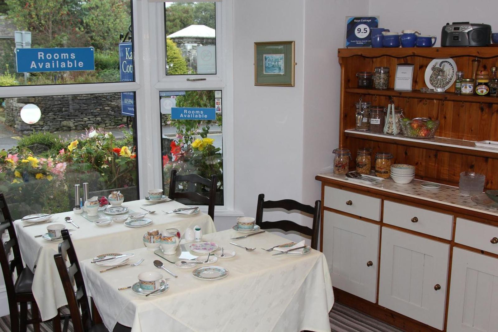Dining room at Kays Cottage with tables set for breakfast